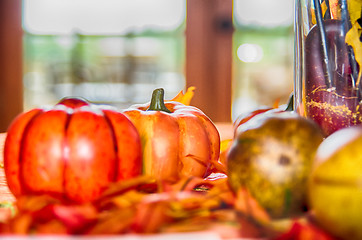 Image showing autumn harvest with pumpkins on table