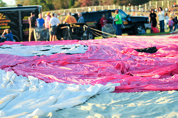 Image showing hot air balloon ready for assembly on a field