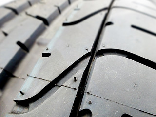 Image showing tire tread closeup in a tire shop