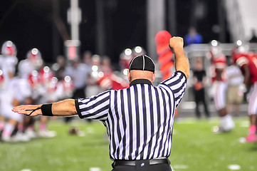 Image showing Closeup of the back of a football referee