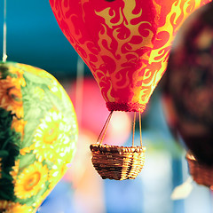 Image showing Colorful hot air balloons at festival 