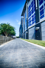 Image showing walking along stadium on a boulevard city street