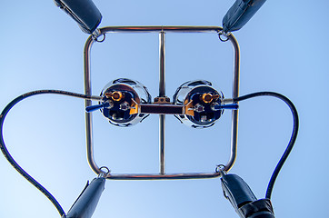 Image showing hot air balloon burners on blue sky