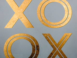 Image showing golden xoxo letters on canvas board