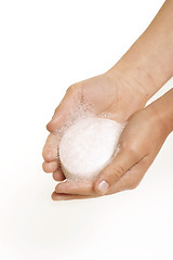 Image showing Holding soap