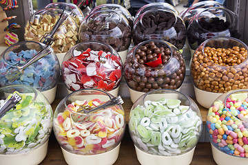 Image showing Colorful candies in glass bowls