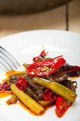 Image showing fried chili pepper and vegetable on a wok pan