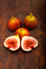 Image showing fresh figs over old wood