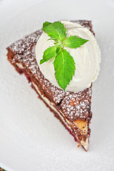 Image showing chocolate cake with jam ice cream