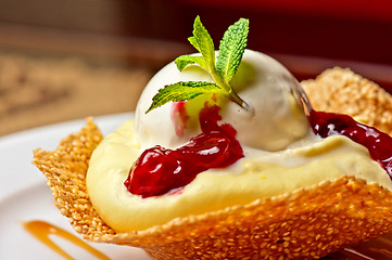 Image showing cake with jam ice cream