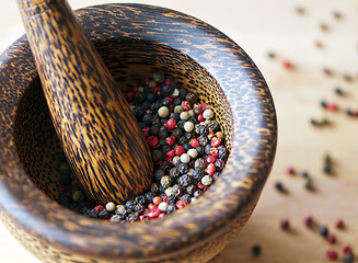 Image showing Red, black, green and white peppercorns