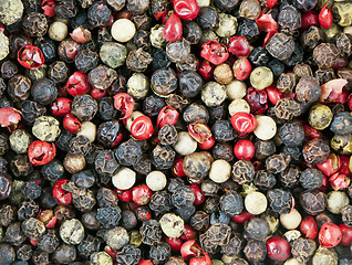 Image showing Red, black, green and white peppercorns