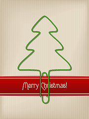 Image showing Striped christmas greeting with tree shaped paper clip