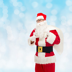 Image showing man in costume of santa claus with bag