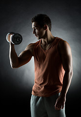 Image showing young man with dumbbell