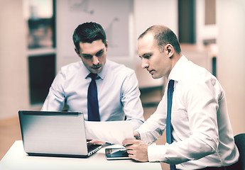 Image showing two businessmen having discussion in office