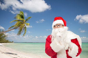 Image showing man in costume of santa claus with bag