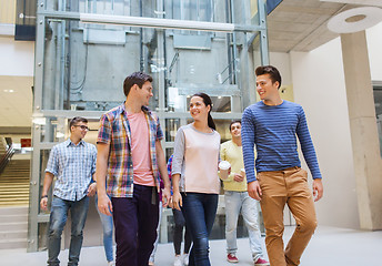 Image showing group of smiling students with paper coffee cups