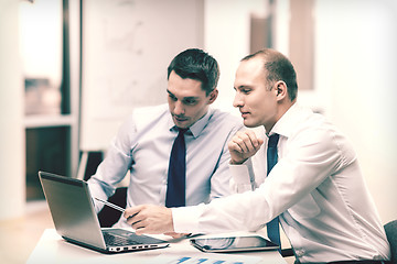 Image showing two businessmen having discussion in office