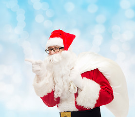 Image showing man in costume of santa claus with bag