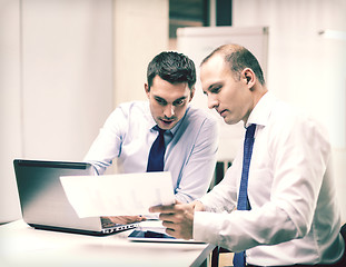 Image showing two businessmen having discussion in office