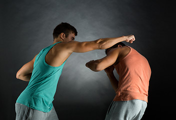 Image showing young men wrestling