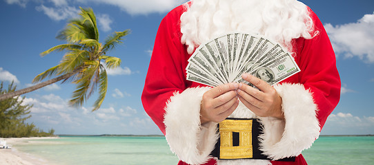Image showing close up of santa claus with dollar money