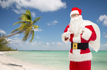 Image showing man in costume of santa claus with bag