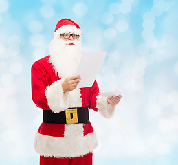 Image showing man in costume of santa claus with letter