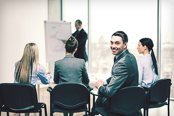 Image showing businessman with team in office