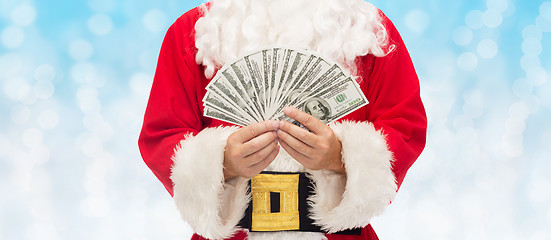 Image showing close up of santa claus with dollar money