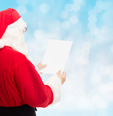 Image showing man in costume of santa claus with letter