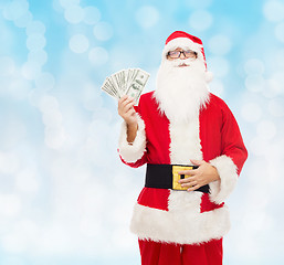 Image showing man in costume of santa claus with dollar money