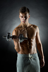 Image showing young man with dumbbell