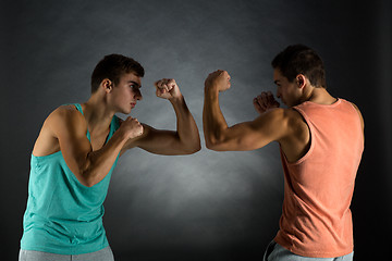 Image showing young men wrestling