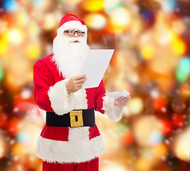 Image showing man in costume of santa claus with letter