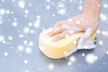 Image showing close up of man washing a car