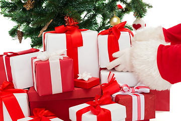 Image showing close up of santa claus with presents