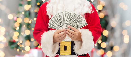 Image showing close up of santa claus with dollar money