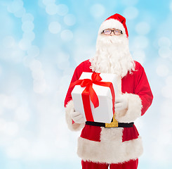 Image showing man in costume of santa claus with gift box