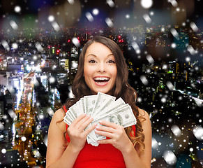 Image showing woman in red dress with us dollar money