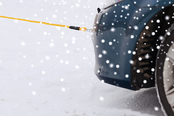 Image showing closeup of towed car with towing rope