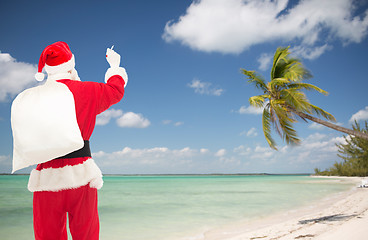 Image showing man in costume of santa claus with bag