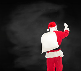 Image showing man in costume of santa claus with bag