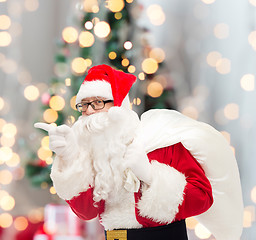 Image showing man in costume of santa claus with bag