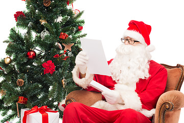 Image showing man in costume of santa claus with letter