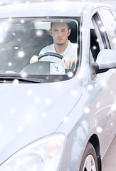 Image showing man driving car and putting parking clock