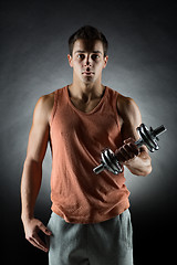 Image showing young man with dumbbell