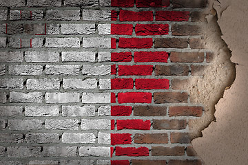 Image showing Dark brick wall with plaster - Malta