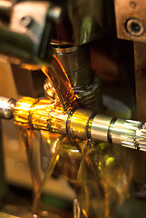 Image showing Oil chilling of detail when machining